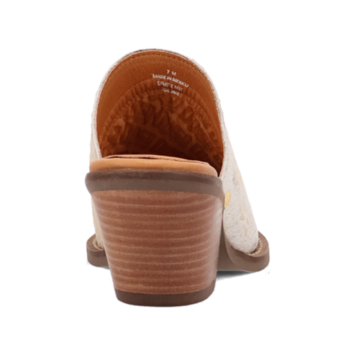 Brown and white shoe with visible brand name on a white background