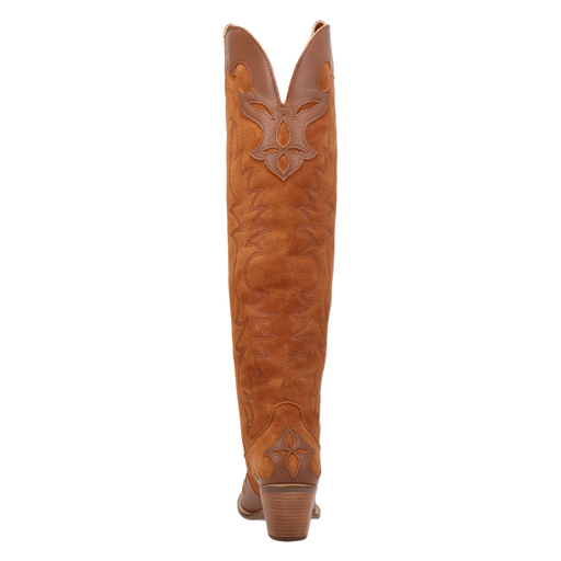 Brown cowboy boot with intricate design on a white background