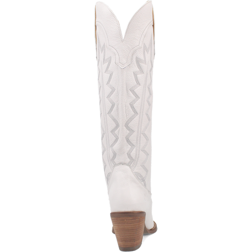 White cowboy boot with brown sole on a white background