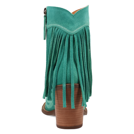Green suede fringe boot with brown heel on a white background